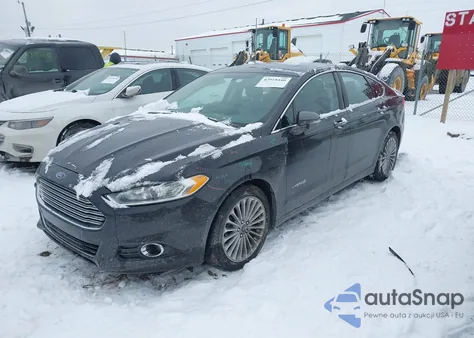 2014 Ford Fusion Hybrid Titanium z USA, uszkodzony, nr VIN 3FA6P0RU7ER192199